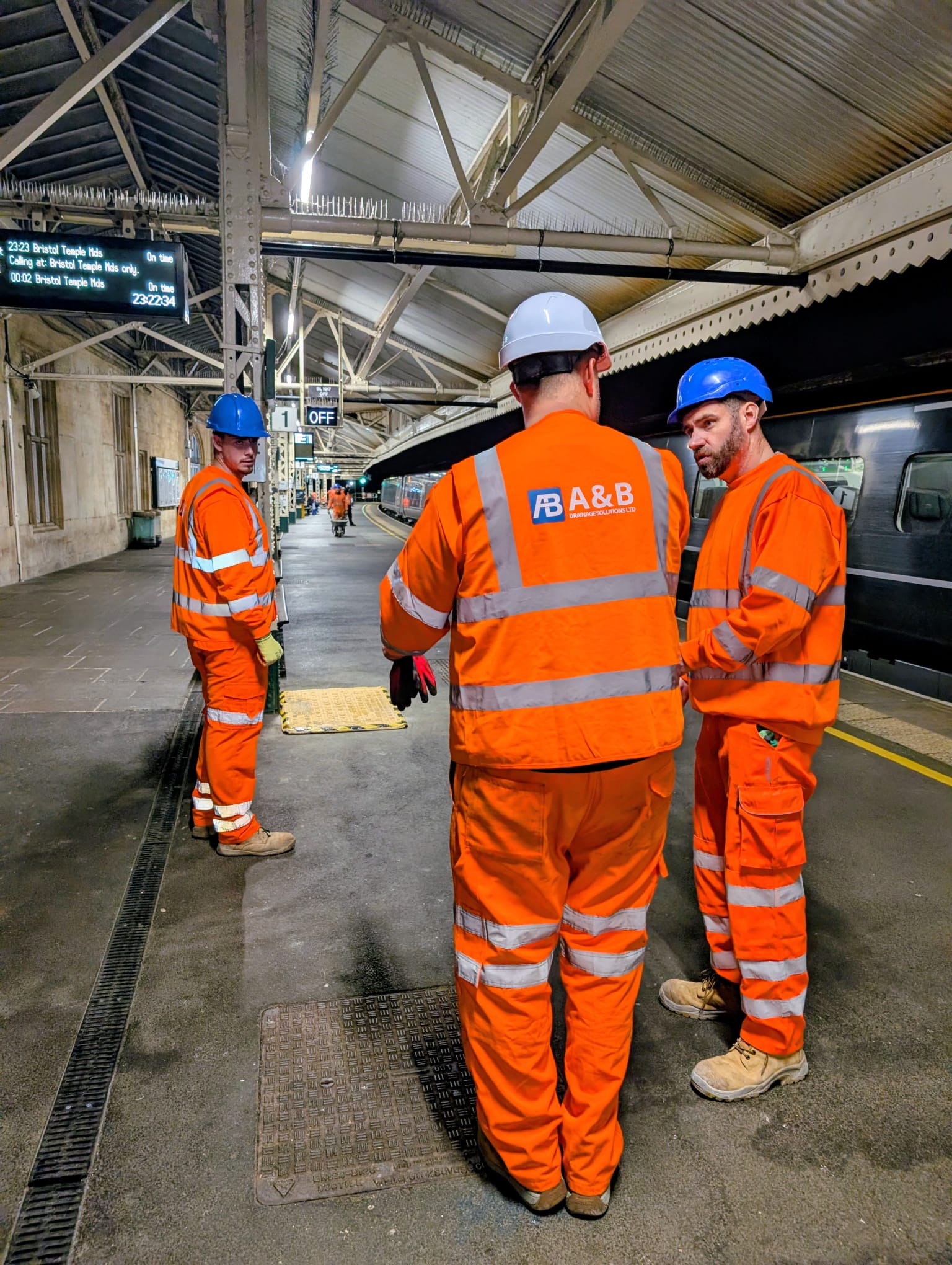 A&B Drainage team on a railway platform